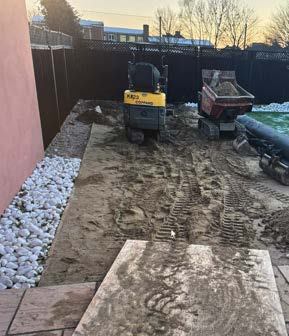 Groundworks and site preparation before outbuilding construction